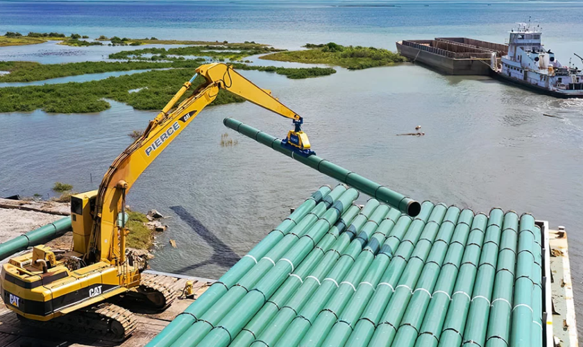 Used heavy equipment for sale in Houston, TX | An Excavator using Vacuwork Overhead Attachment | Boyer Equipment