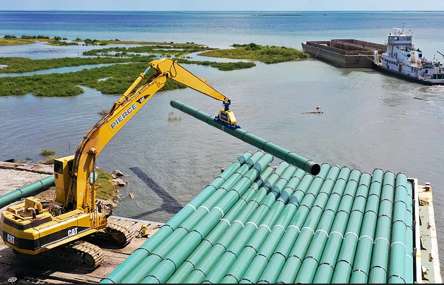 Used heavy equipment for sale in Houston, TX | An Excavator using Vacuwork Overhead Attachment | Boyer Equipment