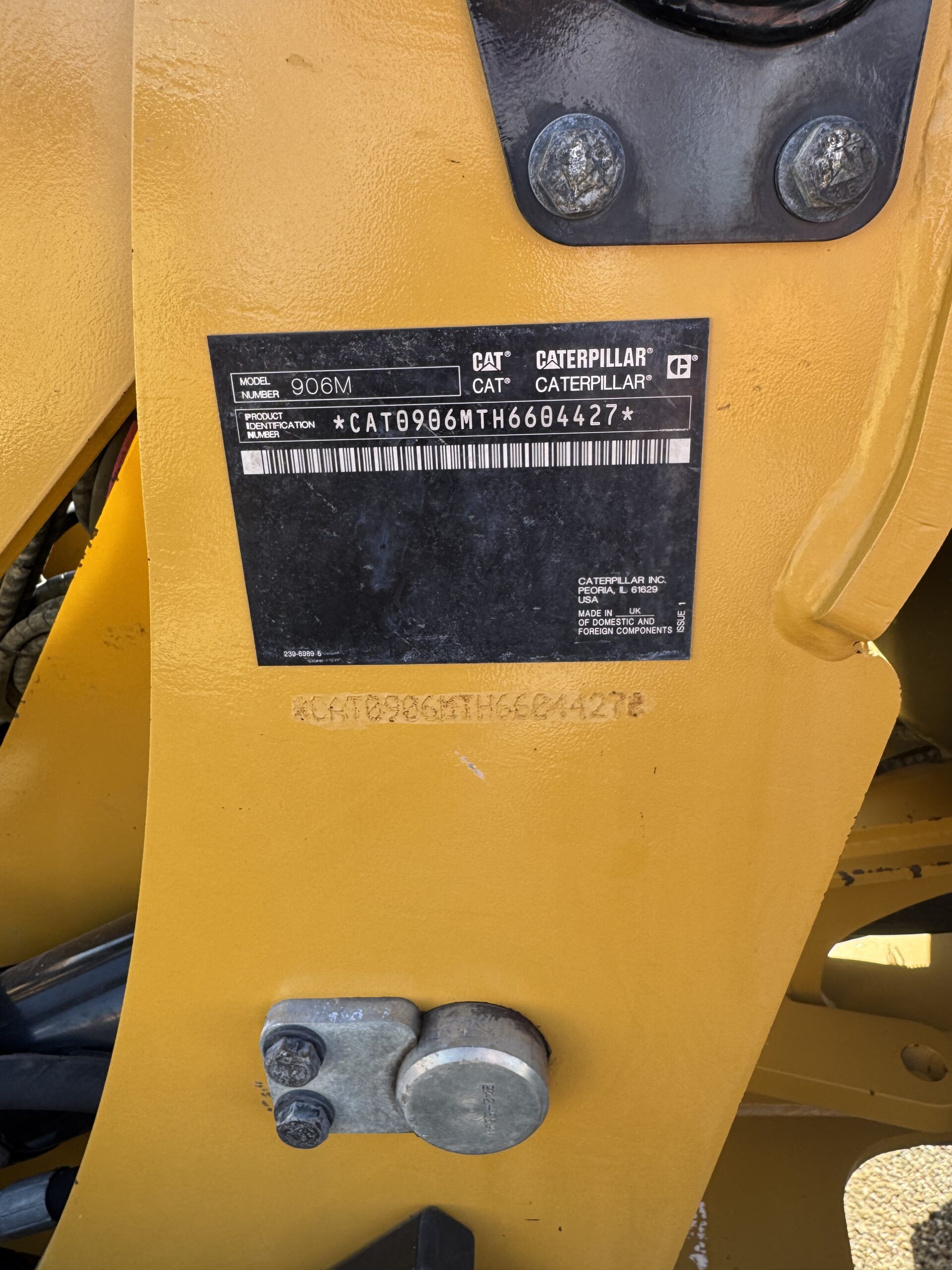 Serial number TH6604427 plate on used wheel loader CAT 906M #4313