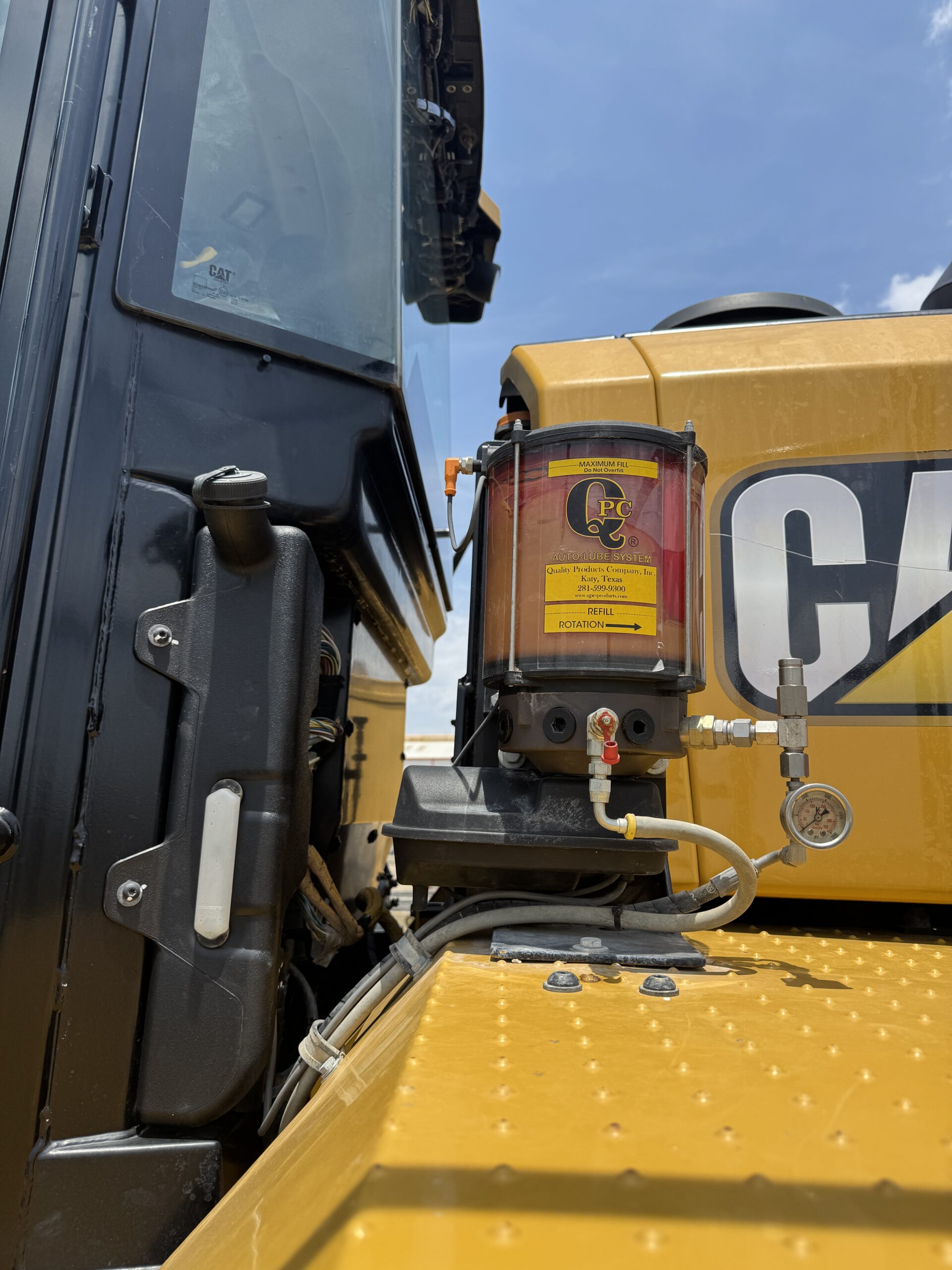 Up close right front cab view of late model Cat 966KM with only 790 hours for sale.
