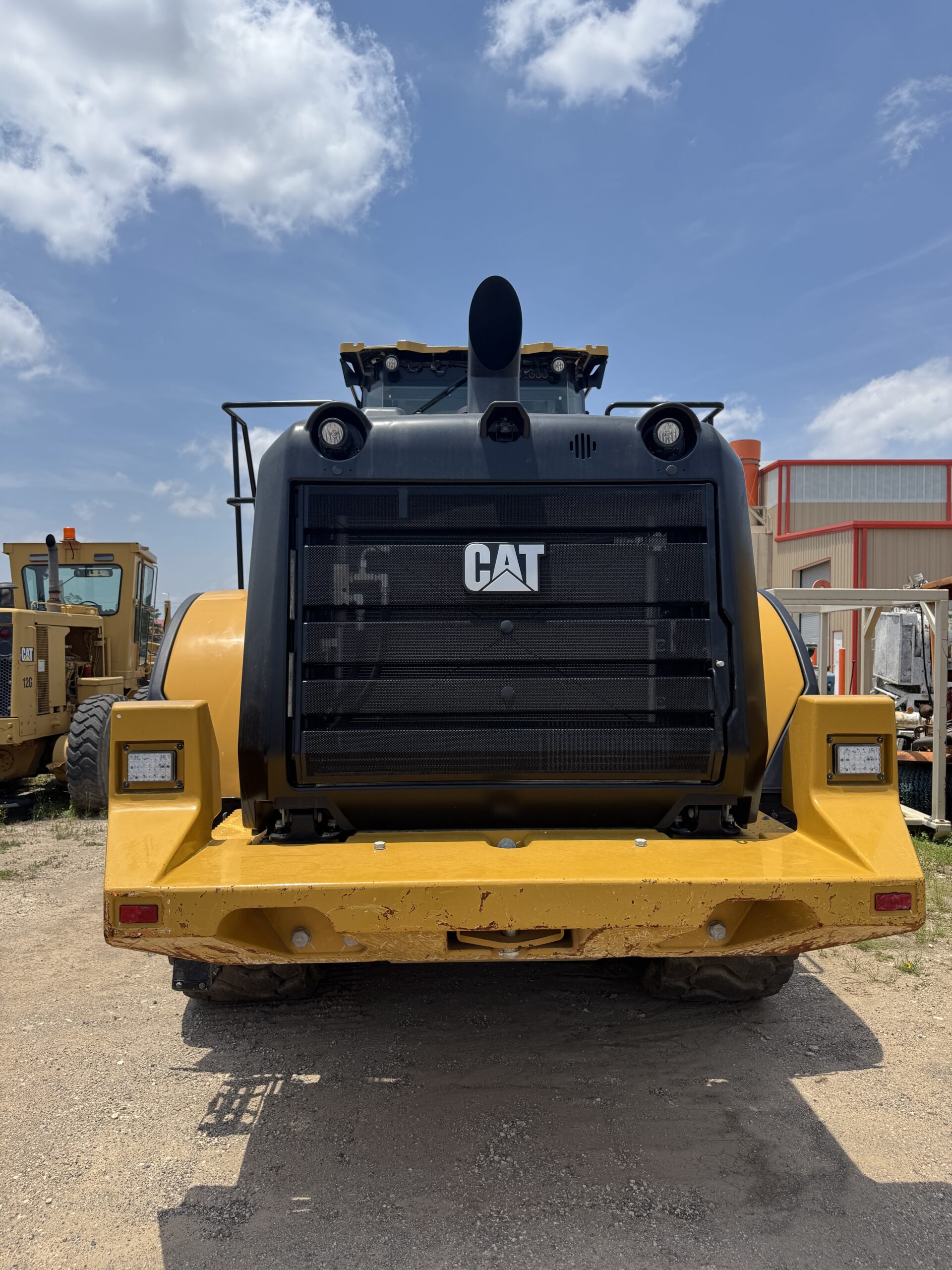 Rear view of late model Cat 966KM