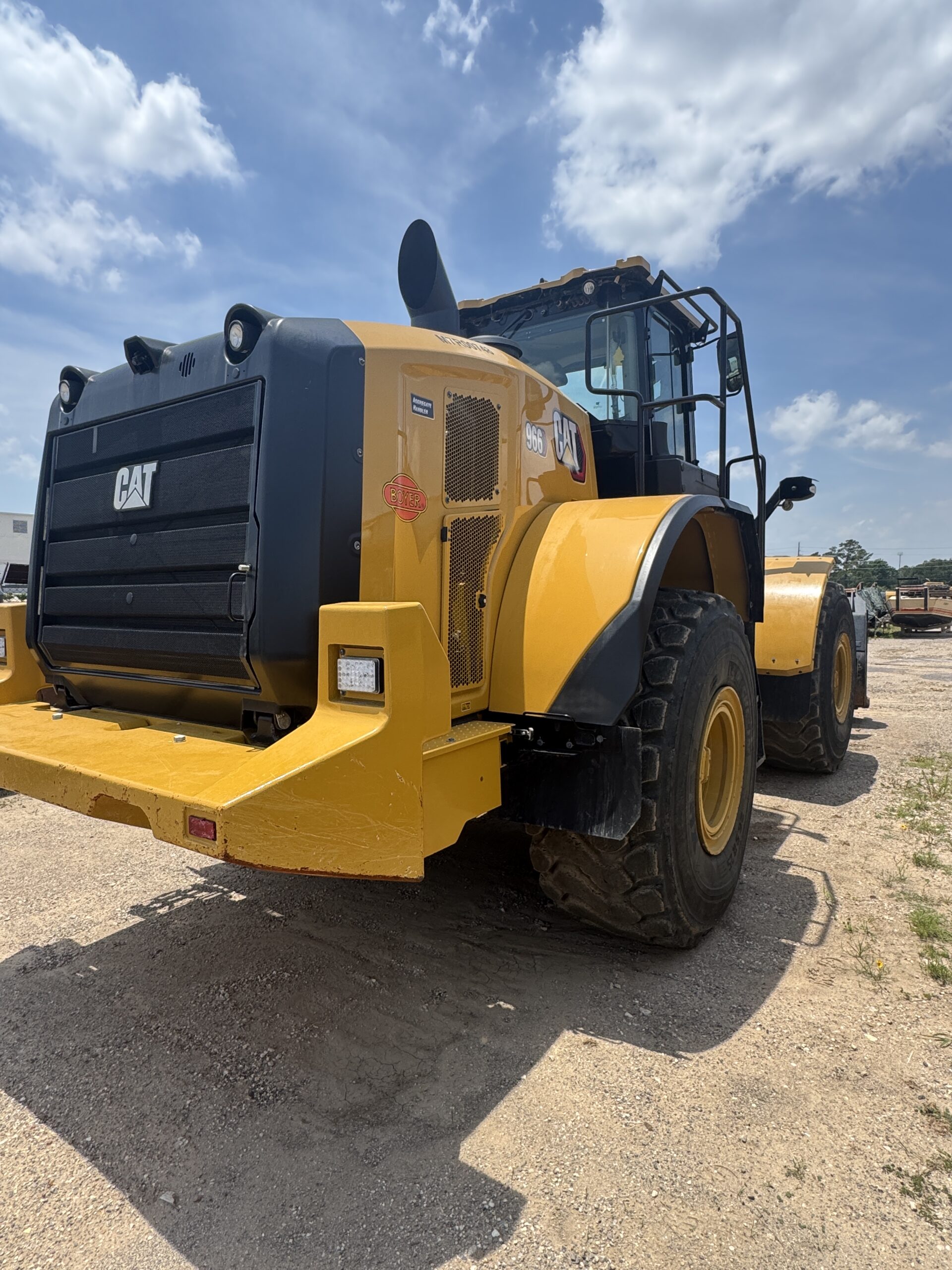 Right rear side view of late model Cat 966KM with only 790 hours for sale.