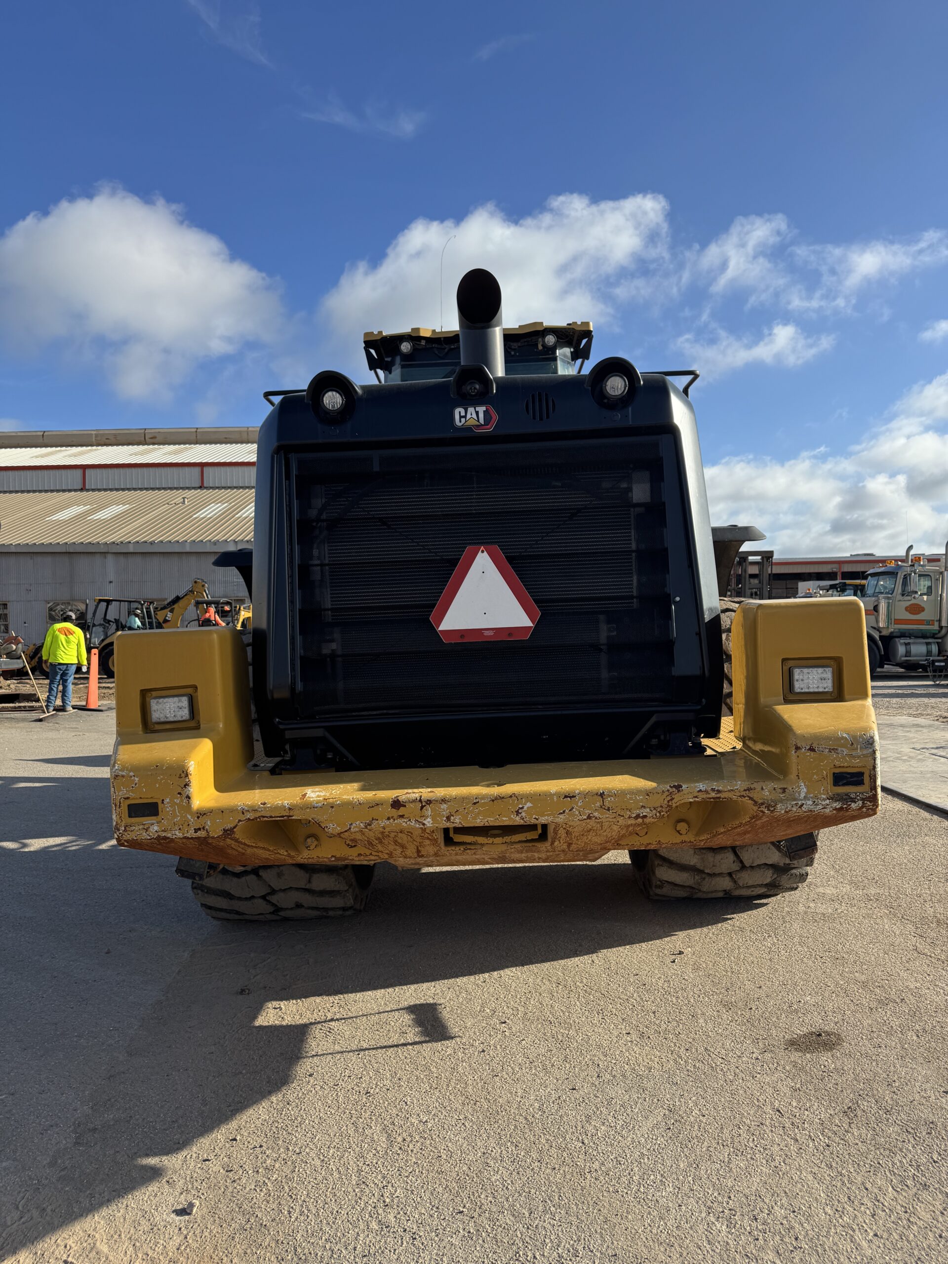 Cat 982M wheel loader #4362 ready for loading and civil construction work, rear view